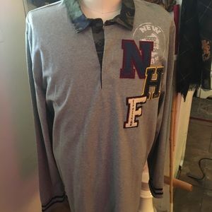 Grey long sleeve polo knit with varsity letters